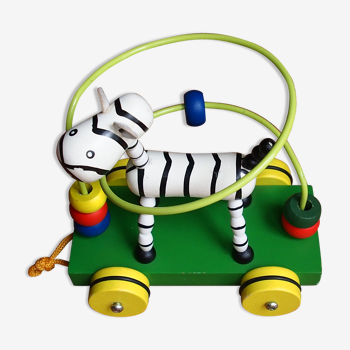 Old wooden toy, zebra car, to pull and push