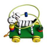 Old wooden toy, zebra car, to pull and push