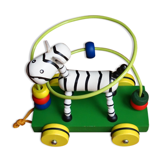 Old wooden toy, zebra car, to pull and push