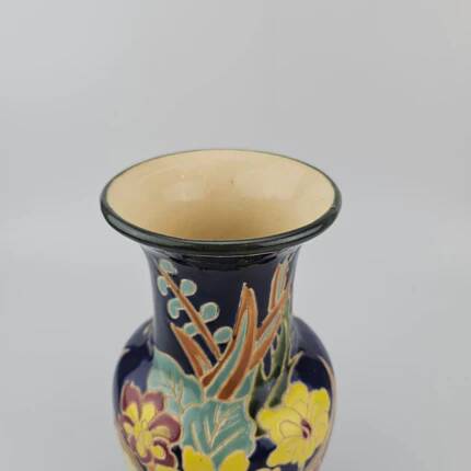 Large multicoloured ceramic vase with floral decoration signed NT.