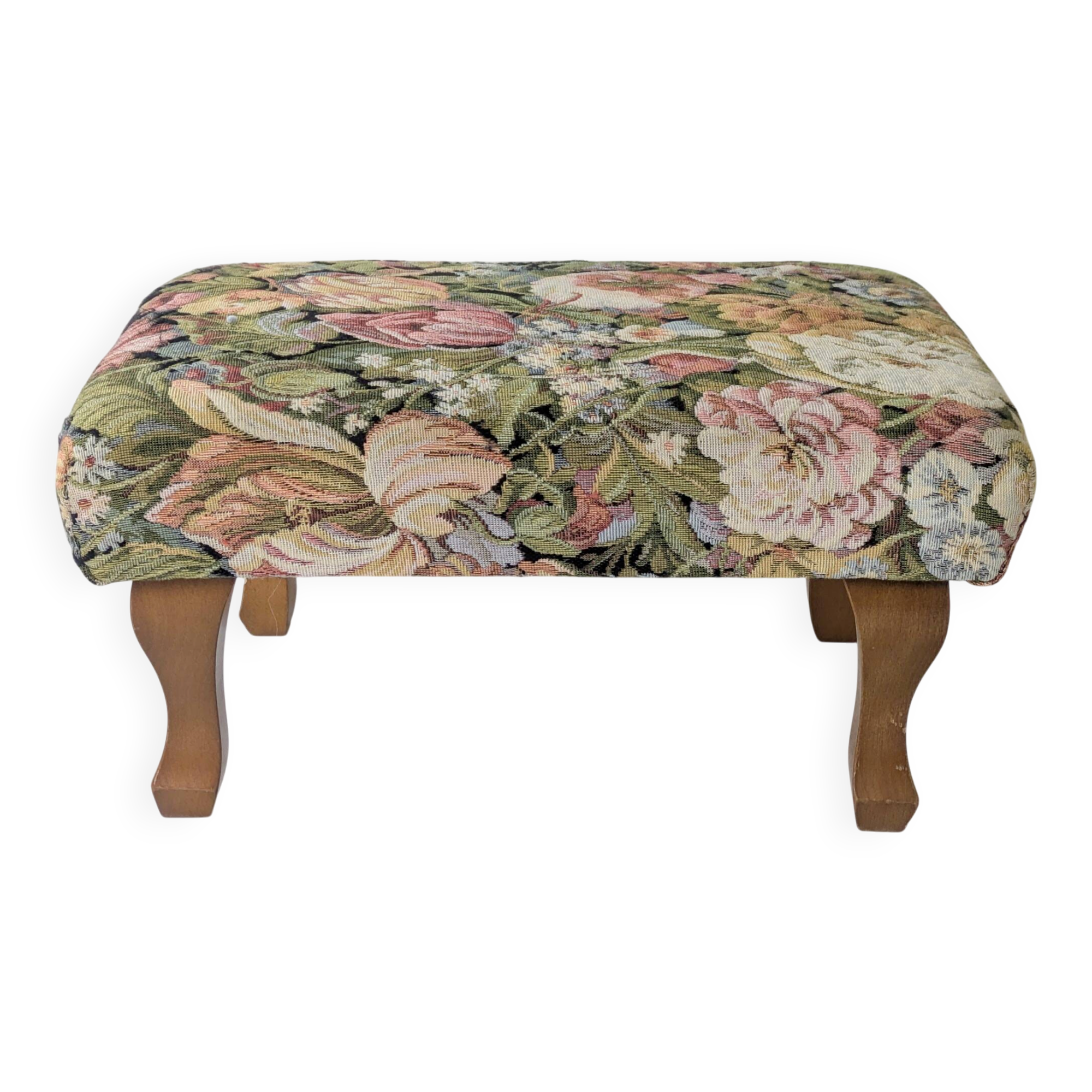 Large vintage upholstered footstool with curved legs.