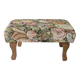 Large vintage upholstered footstool with curved legs.