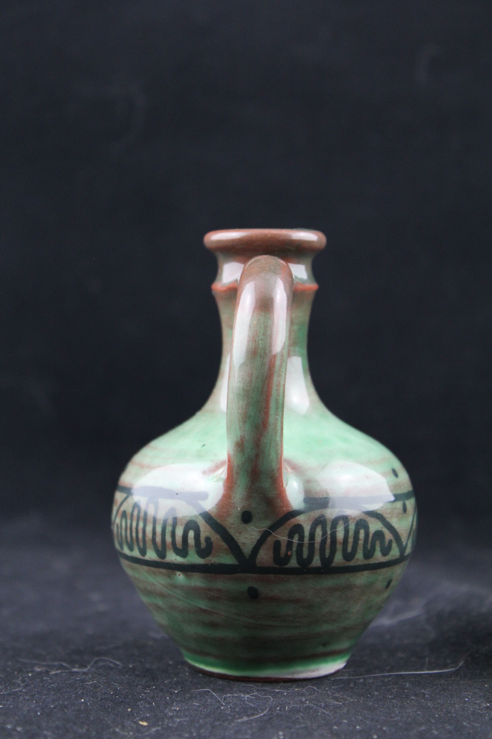 Single-stem vase signed "K" in ceramic