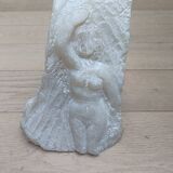 Bust of a woman in a block of alabaster