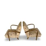 Ensemble de fauteuils Art Déco avec accoudoirs en hêtre arqués.