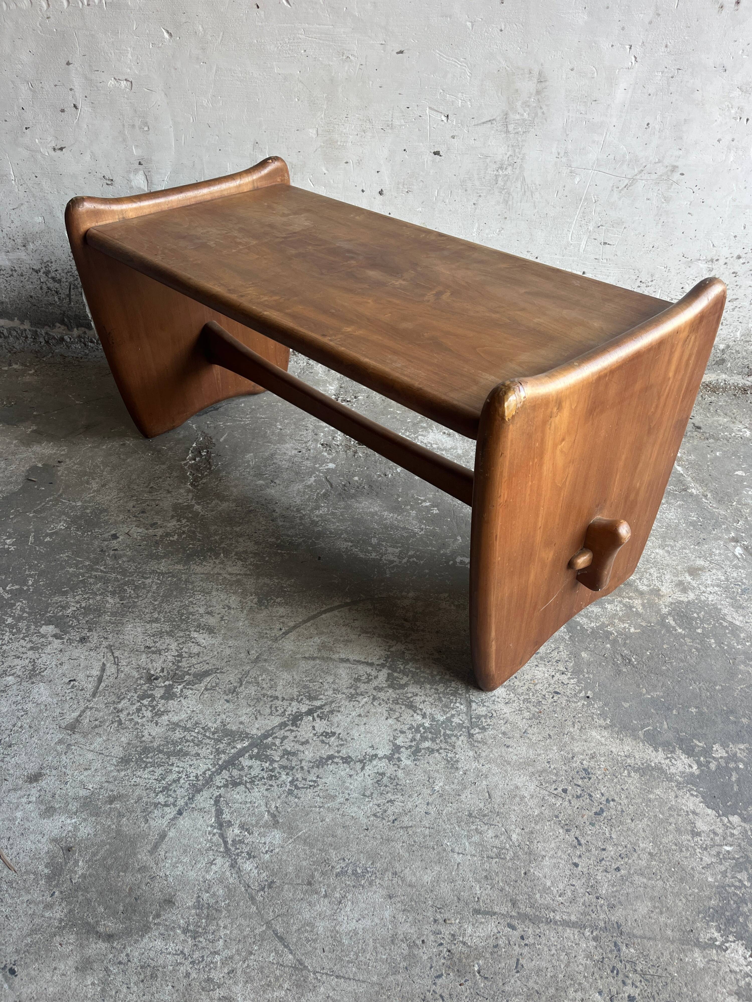 Vintage sculptural coffee table in wood