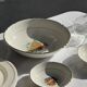 Vintage fruit salad service consisting of a bowl and 7 small dishes.