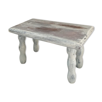 Wooden footrest in his white patina