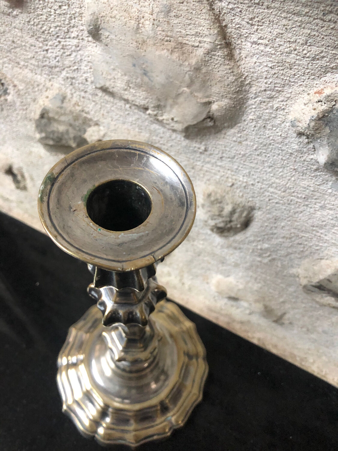 Antique candle holder in silvered bronze