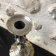 Antique candle holder in silvered bronze