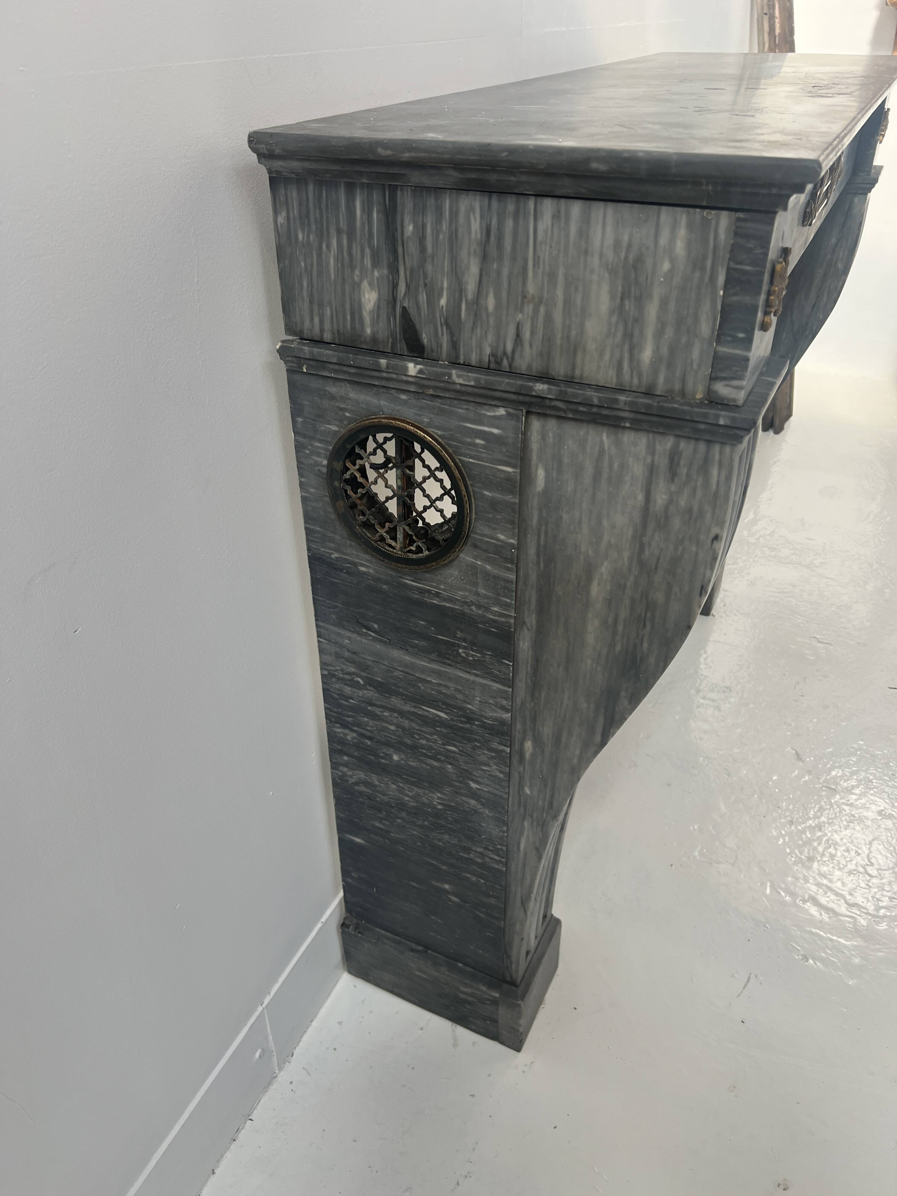 Napoleon III fireplace in blue Turquin marble from the 19th century.