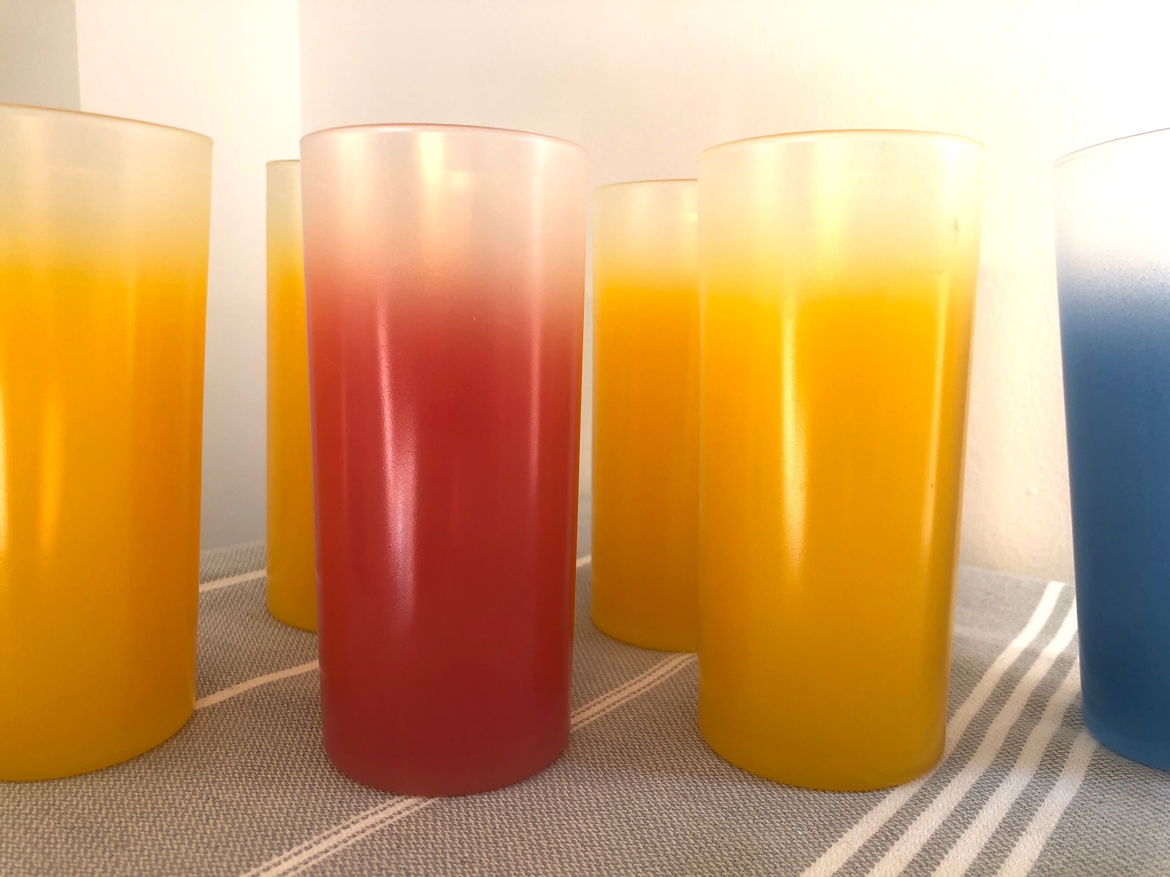 Yellow, red and frosted yellow orangeade glasses made of vintage glass