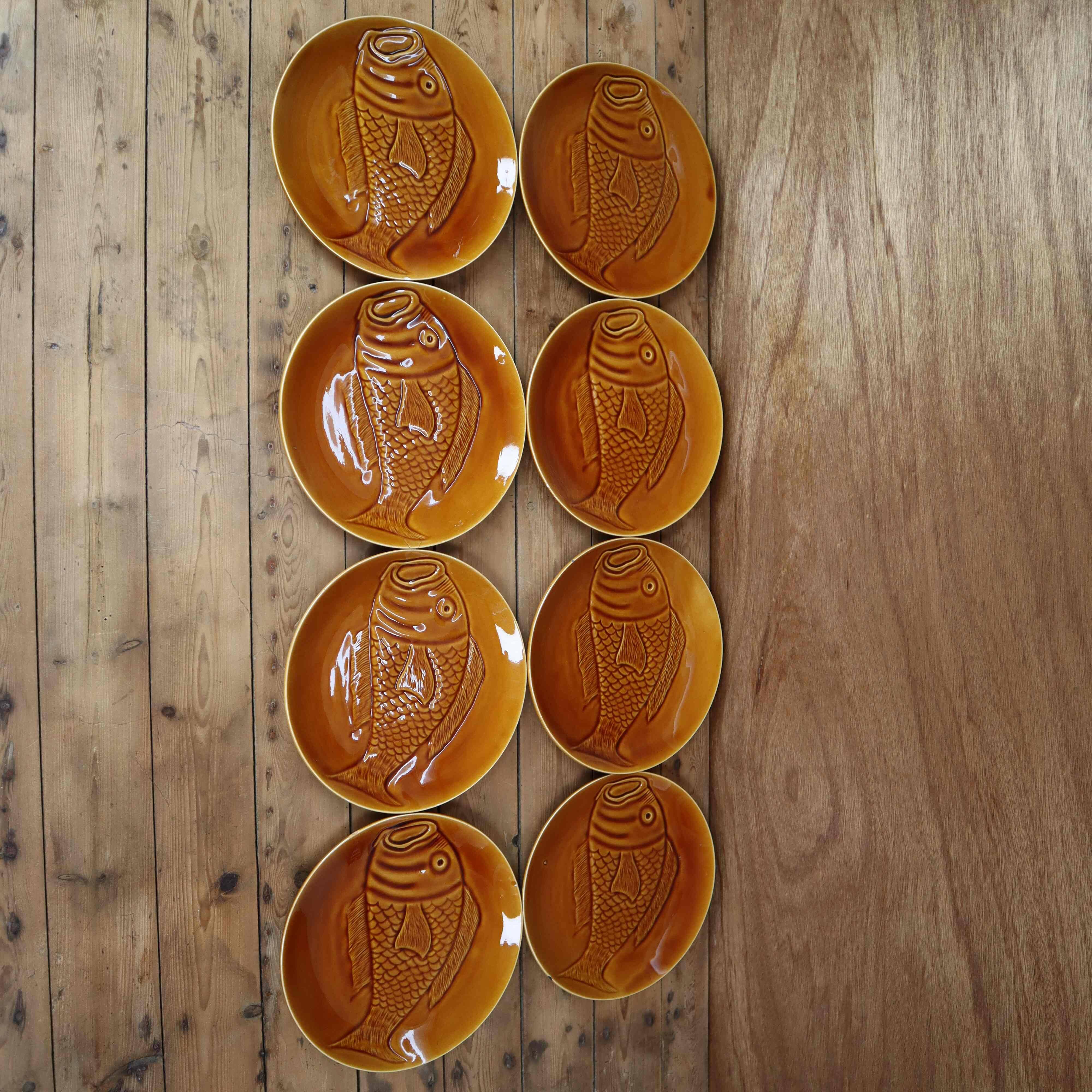 8 glazed flat plates with vintage fish decoration Saint Amand