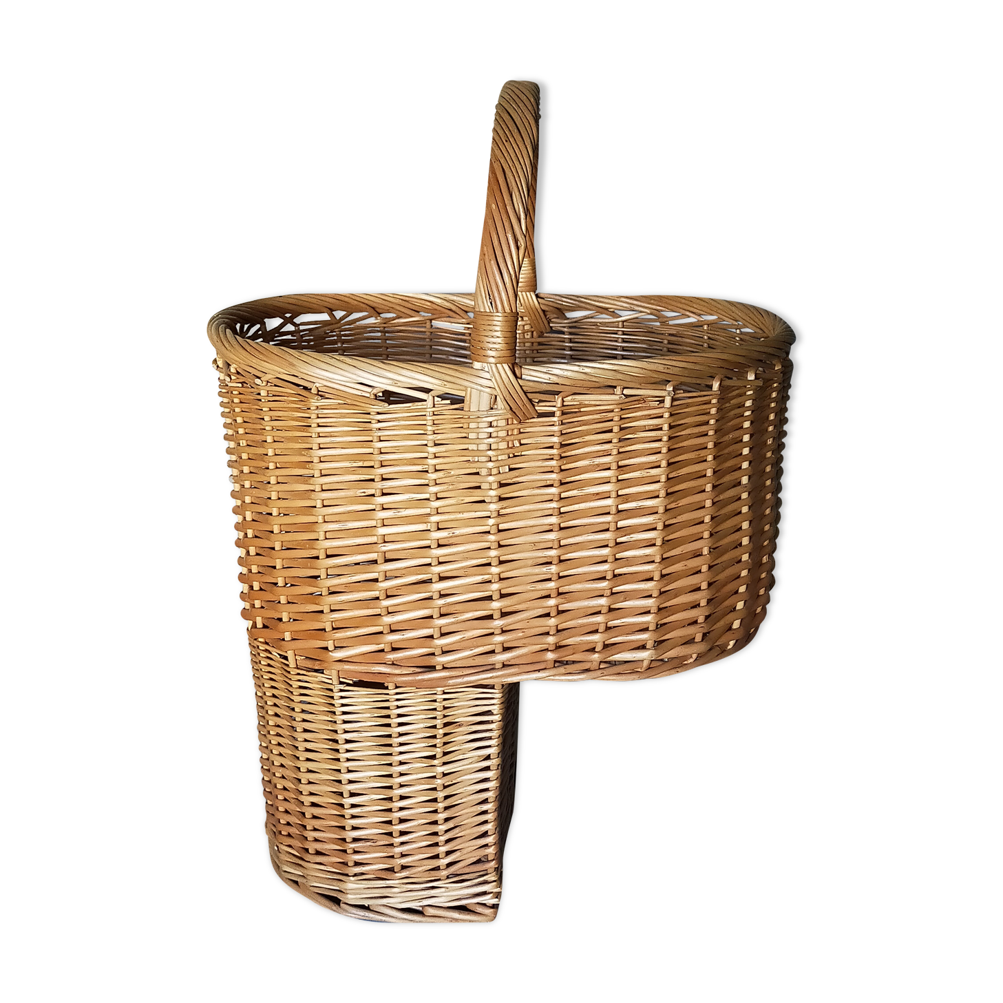 Asymmetrical woven rattan basket