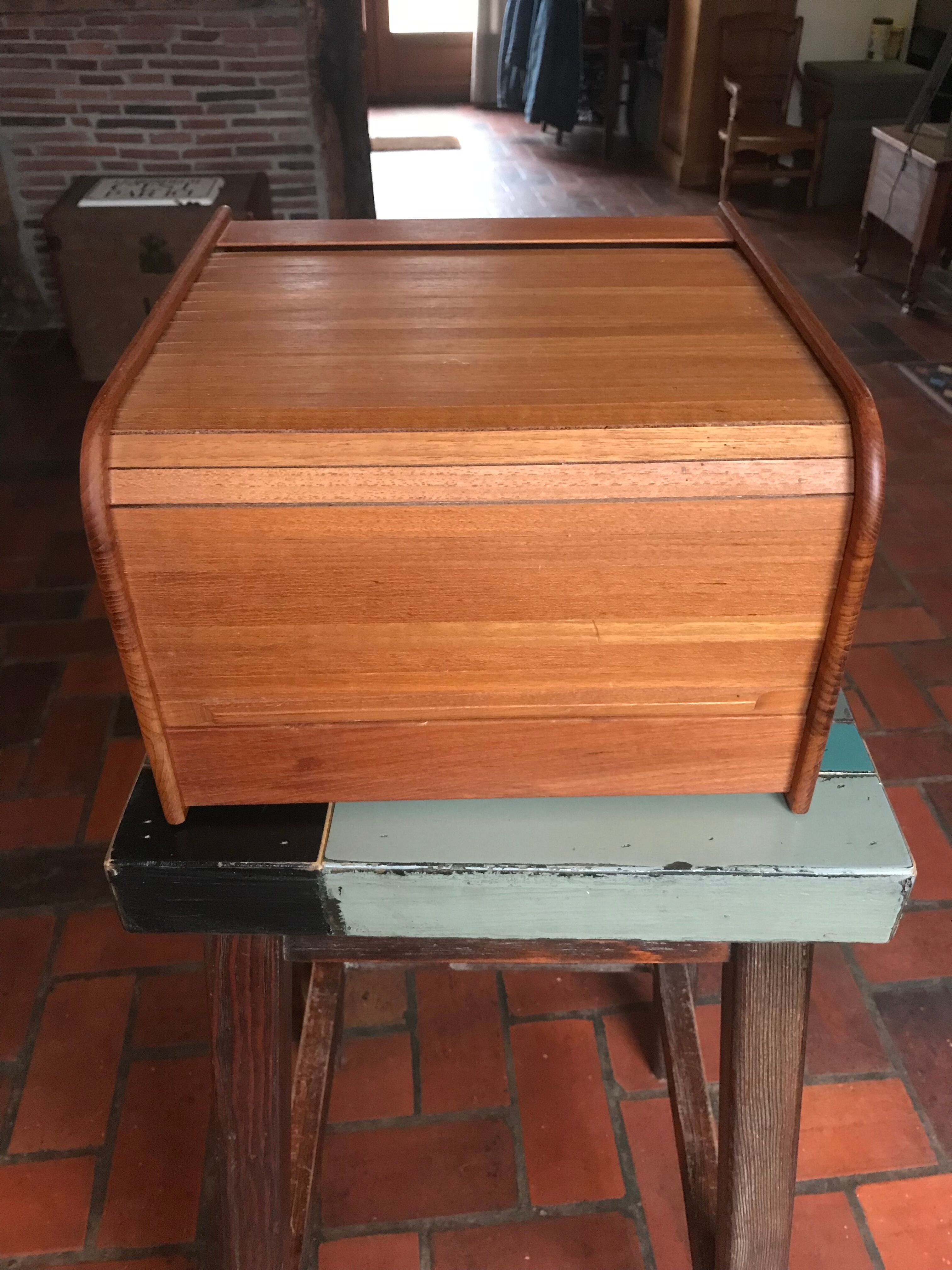 Teak box with curtain door