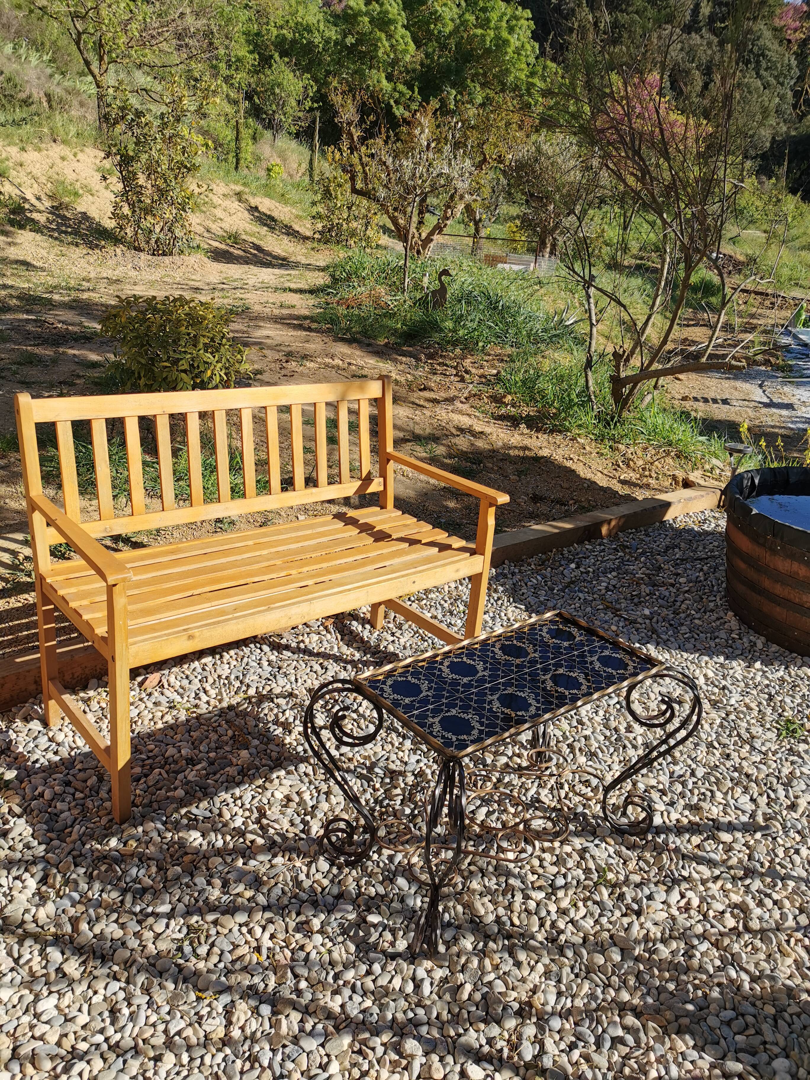 Vintage coffee table wrought iron and black and gold ceramic
