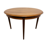 Scandinavian round table in teak with extension of the 60s / 70s