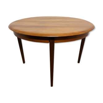 Scandinavian round table in teak with extension of the 60s / 70s
