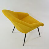 Yellow shell armchair
