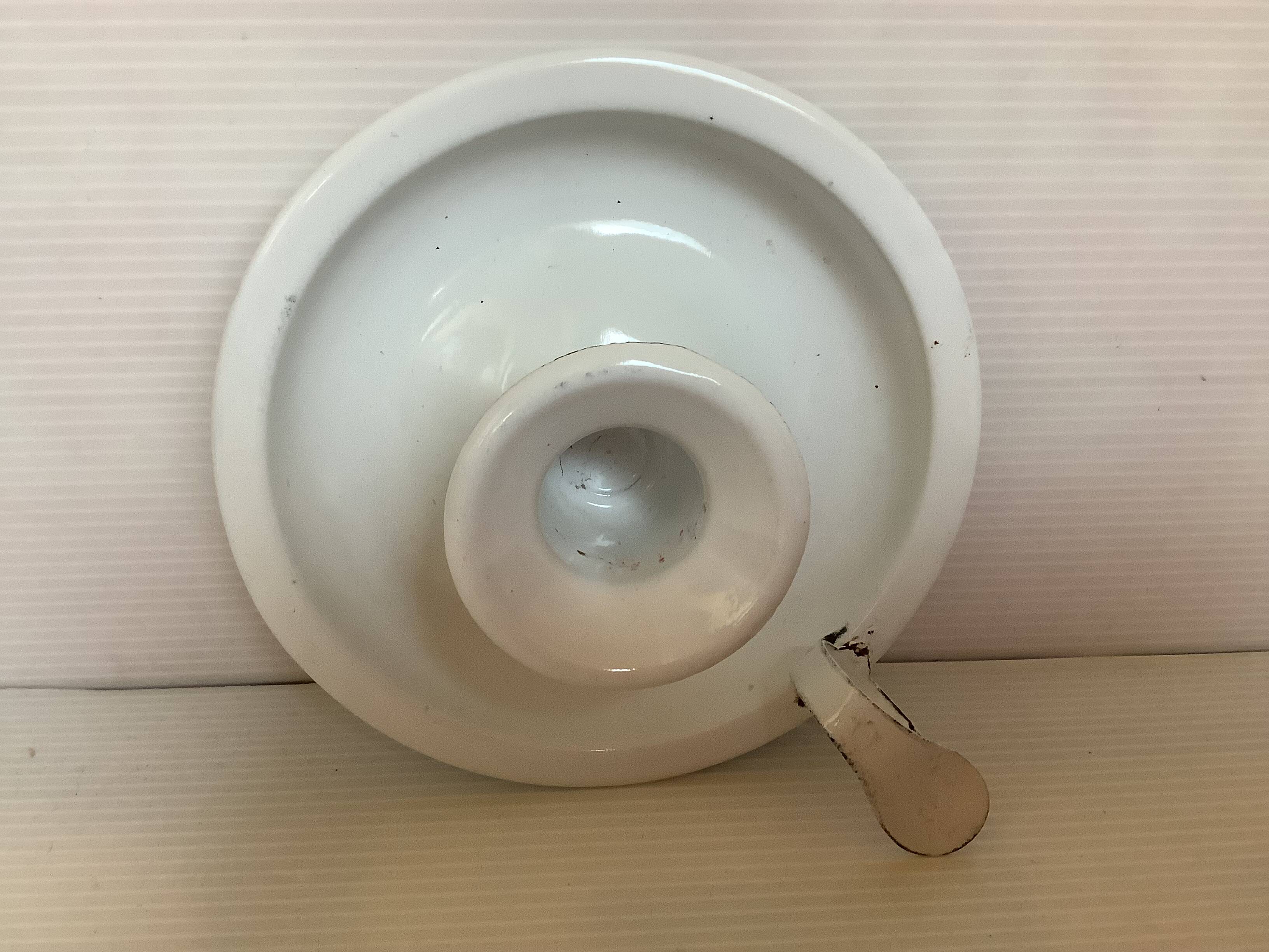 Cave rat candle holder in enamelled sheet metal