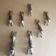 7 silver metal knife holders