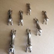 7 silver metal knife holders