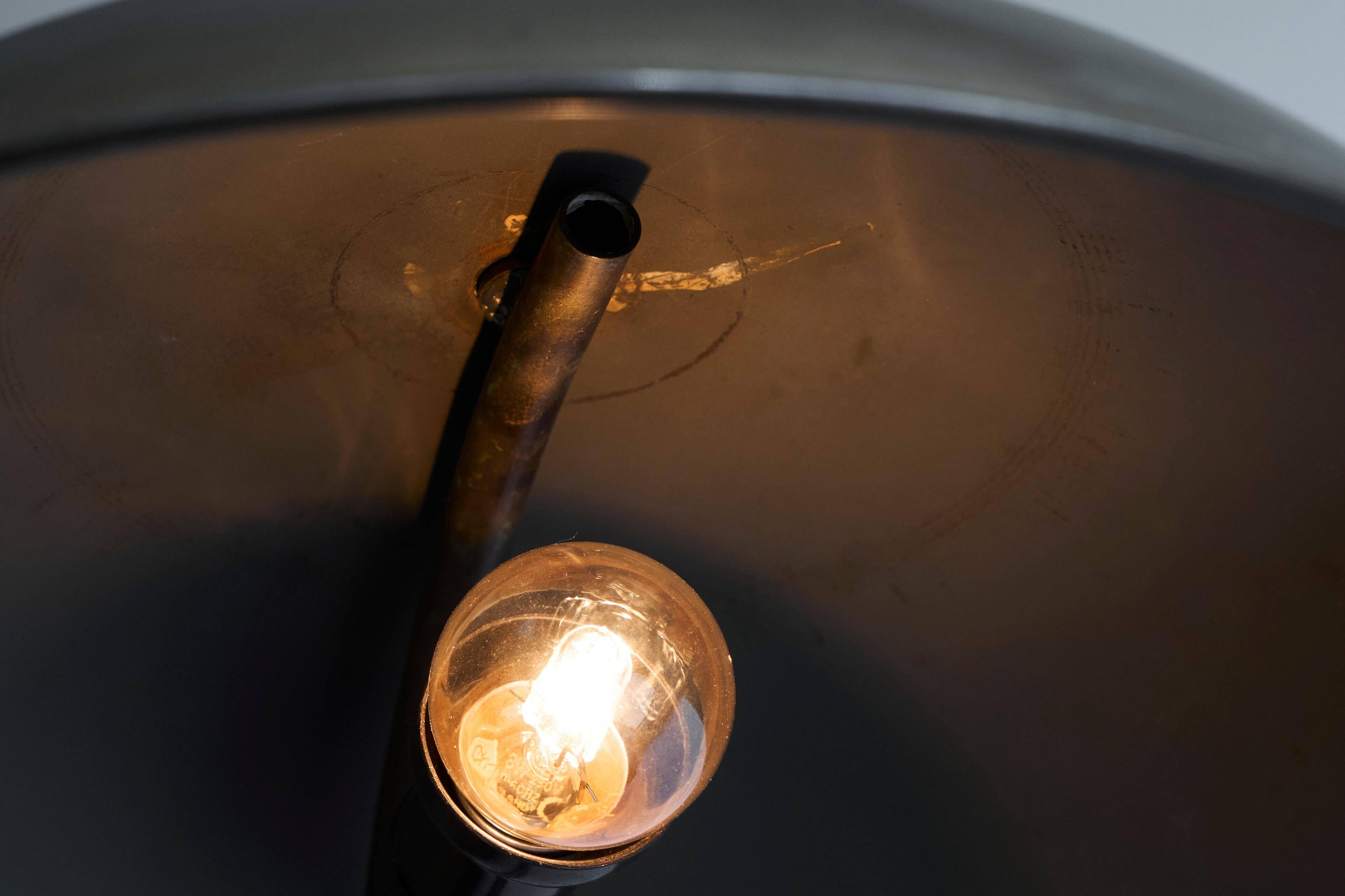Bauhaus style table lamp in patinated brass from the 1930s.