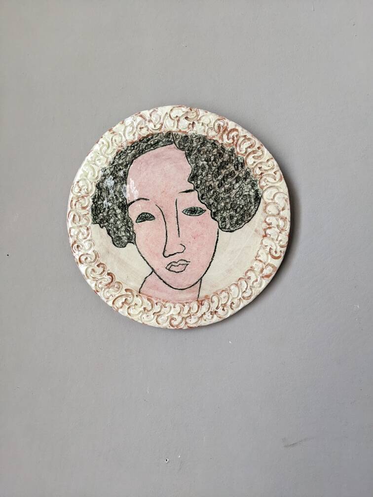 Handmade ceramic wall hanging portrait enameled medallion