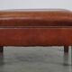 Leather ottoman in classic English style finished with decorative nails