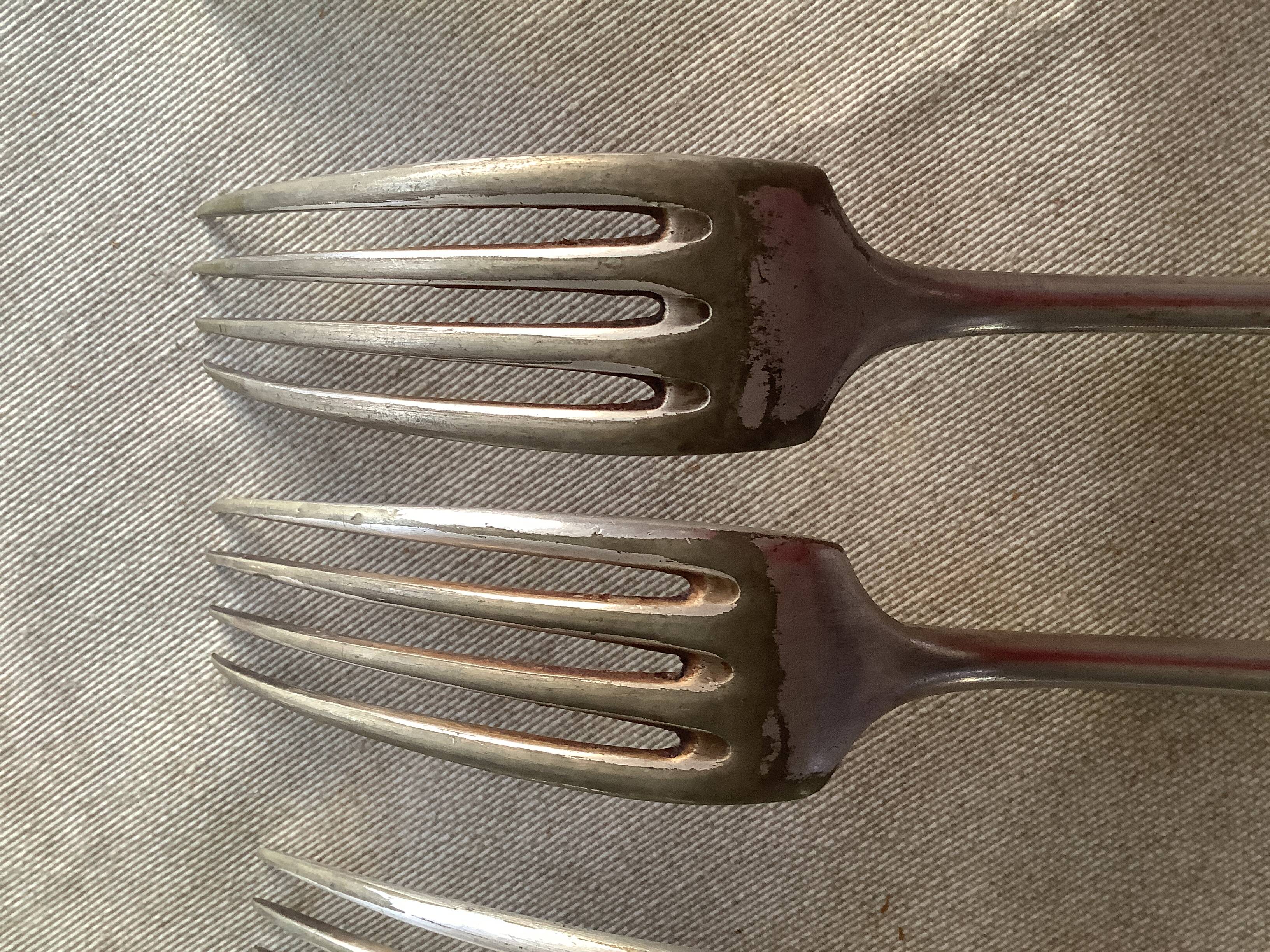 Silver-plated forks with hallmarks