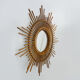 Vintage rattan sun mirror. Year 60