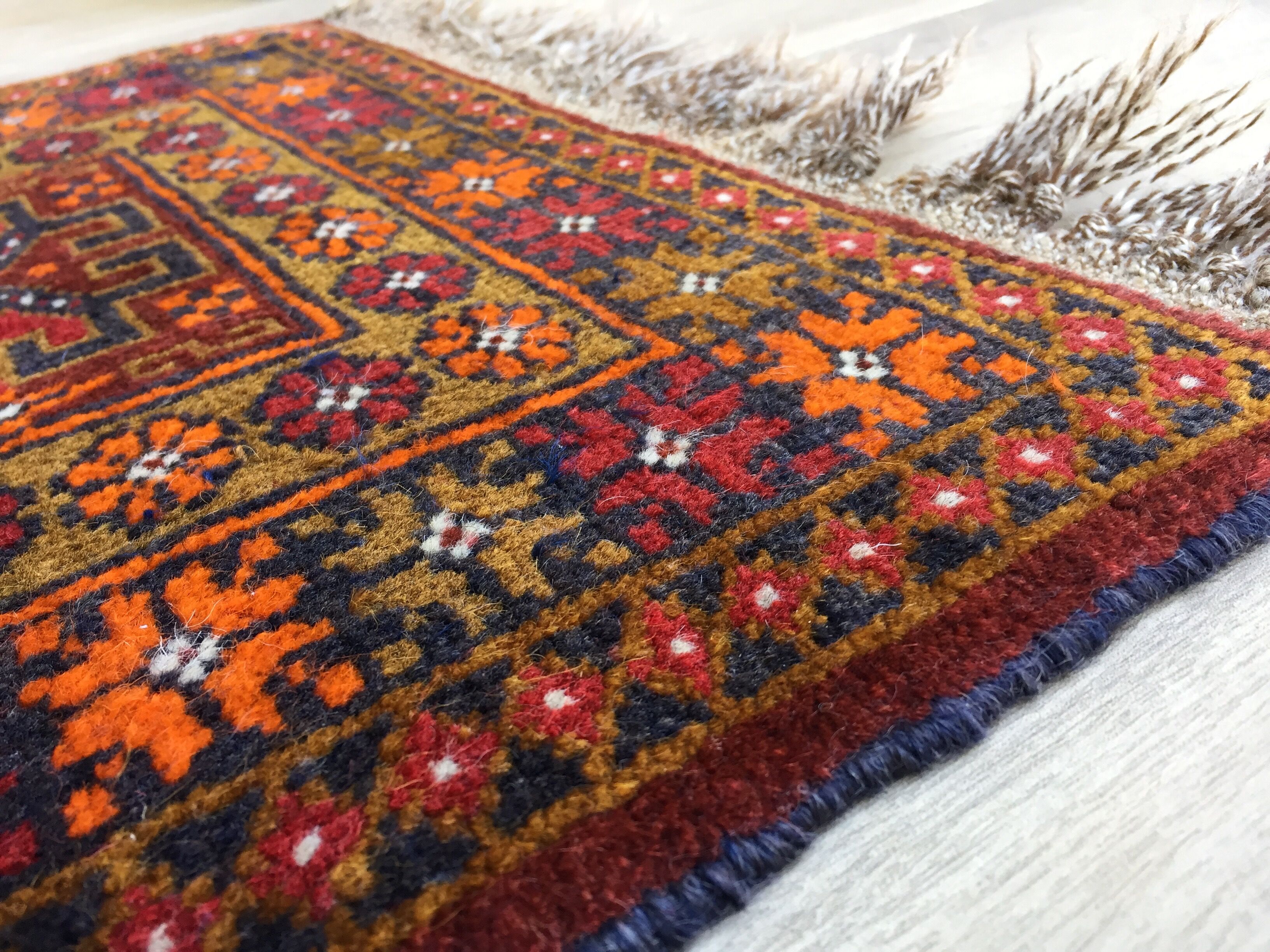Small oriental wool rug - 80 x 46cm