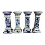 Four candlesticks with blue patterns