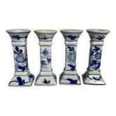 Four candlesticks with blue patterns.