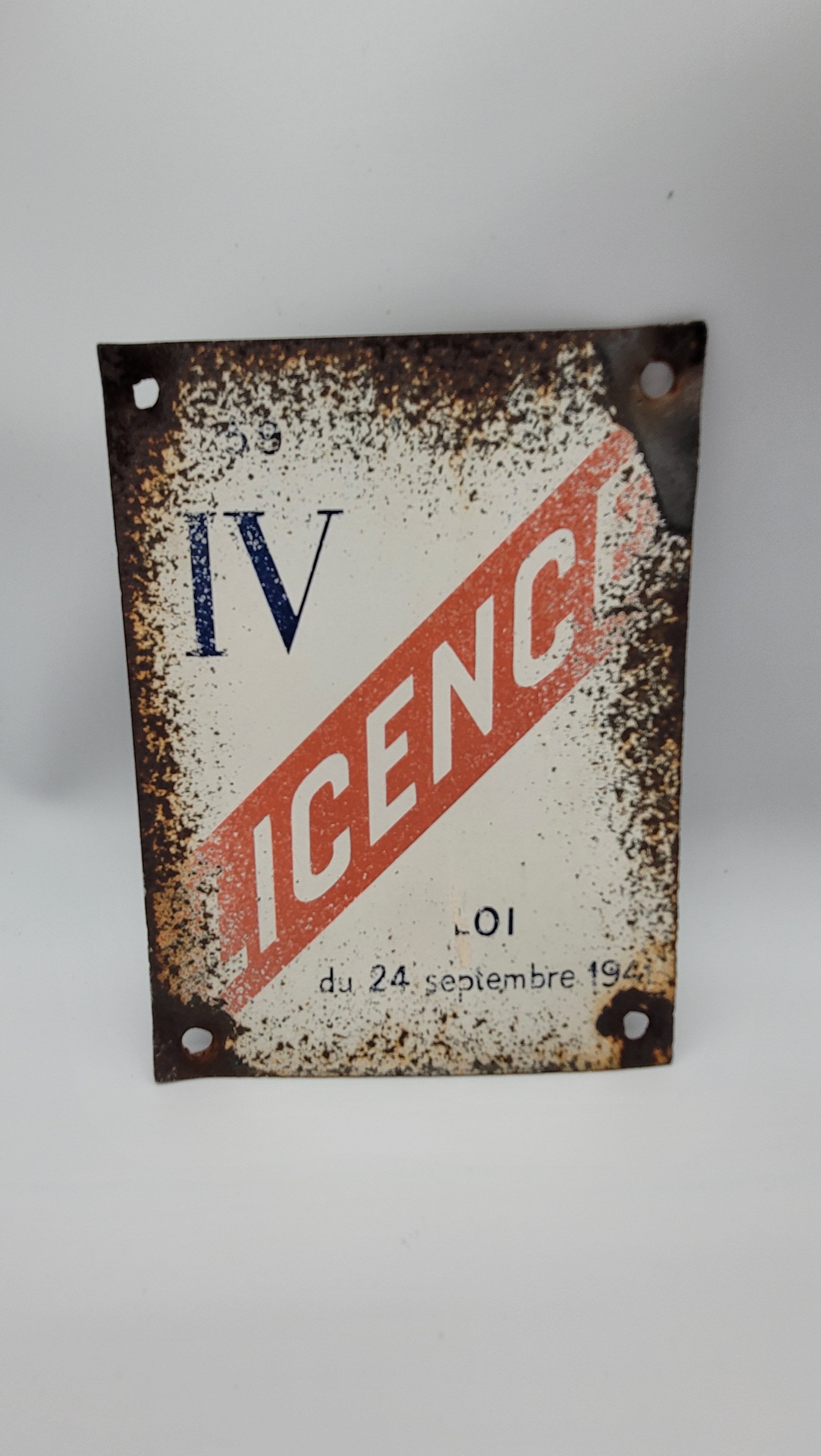 License IV enamelled plate