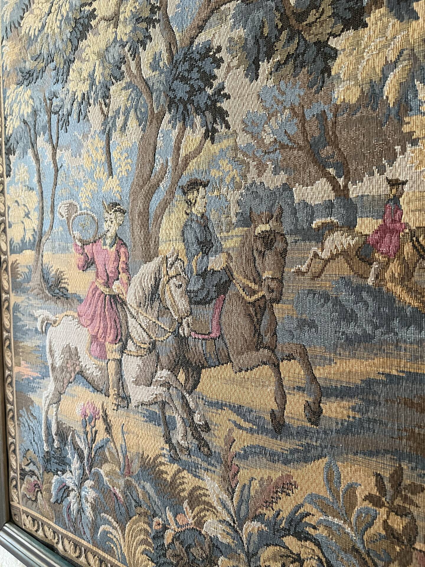 Antique wall tapestry in Aubusson style with a gilded moulded frame.
