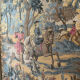 Antique wall tapestry in Aubusson style with a gilded moulded frame.