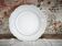 Round porcelain plate, double gold line manufacture, hand-painted.