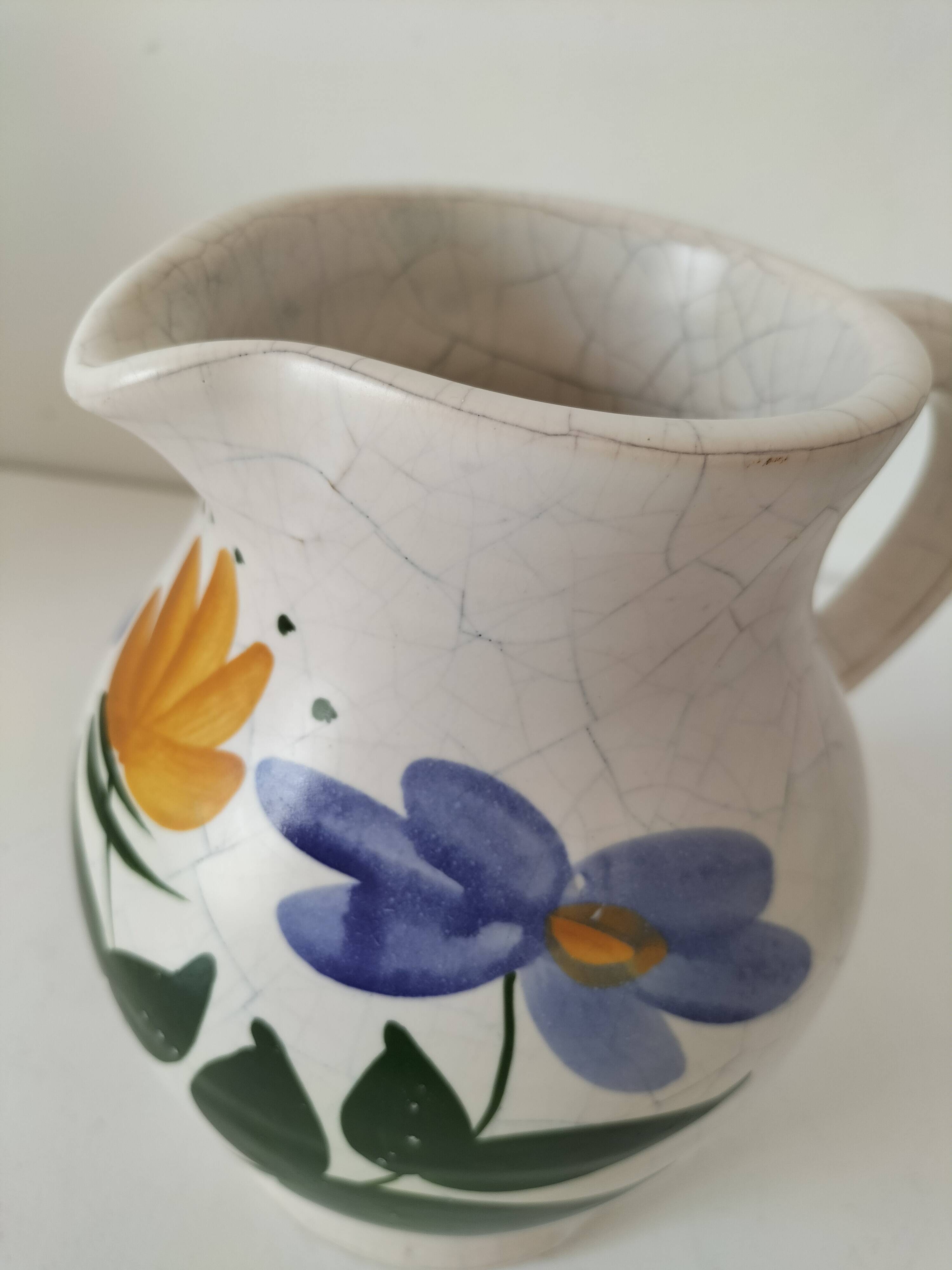Vintage pitcher with floral decoration in the style of Poterie du Marais