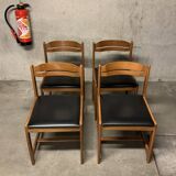 Set of four vintage chairs with retro design skai seats