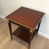 Two-level table in mahogany and brass