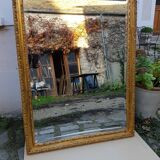 Grand golden mirror in louis xvi style