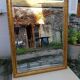 Grand golden mirror in louis xvi style