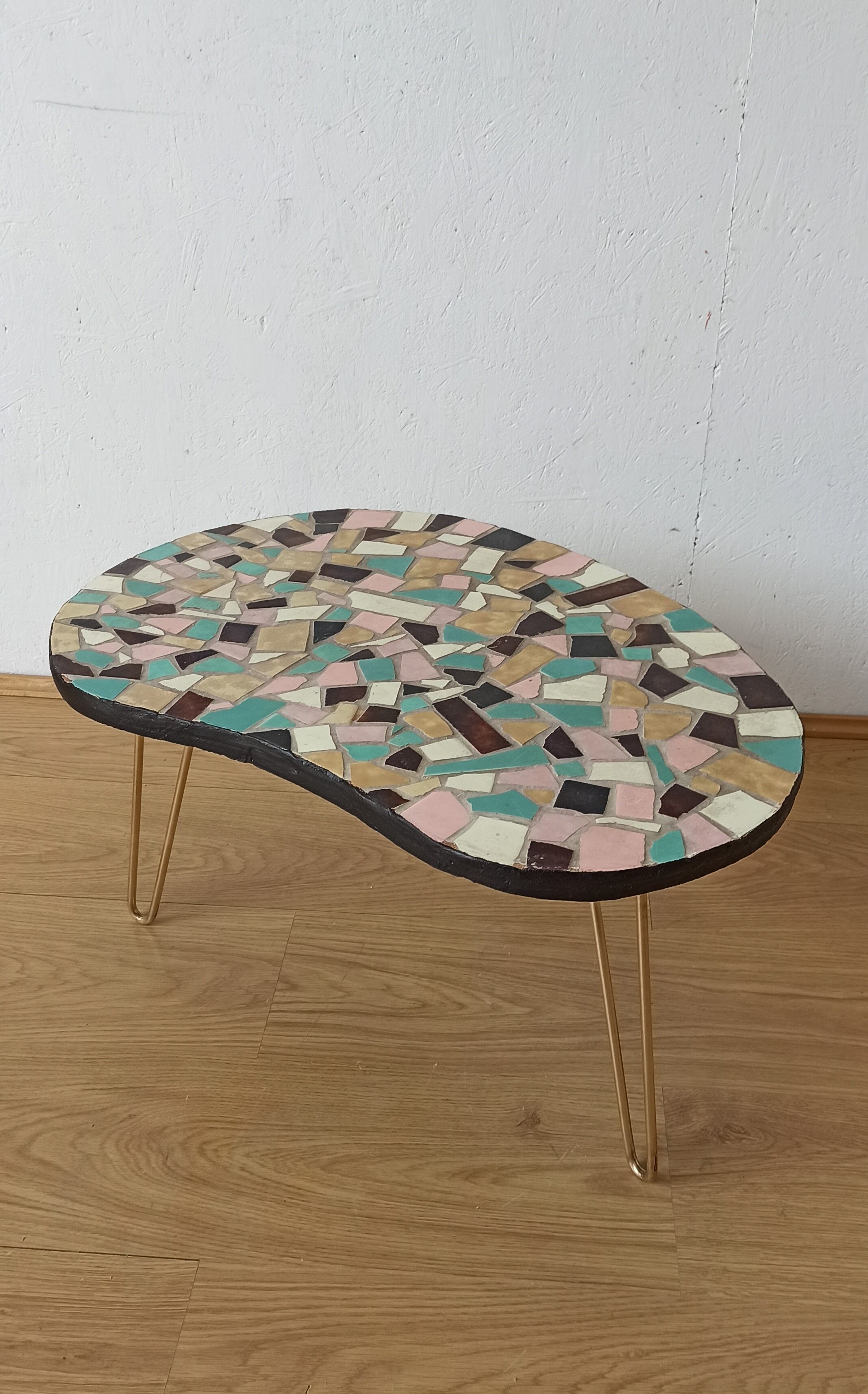 Unusual coffee table on three legs