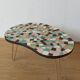 Unusual coffee table on three legs