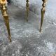 Table basse vintage en marbre noir et laiton