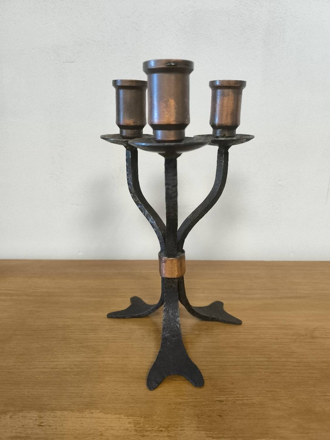 Wrought iron and copper candlestick