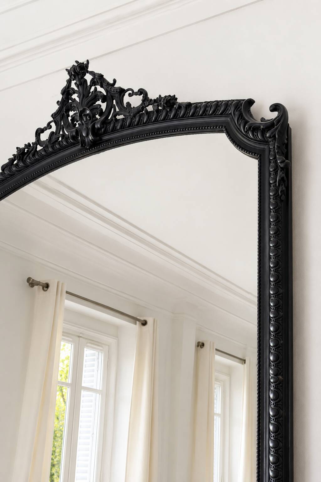 Large antique mirror from the Transition period, with a carved grey frame.