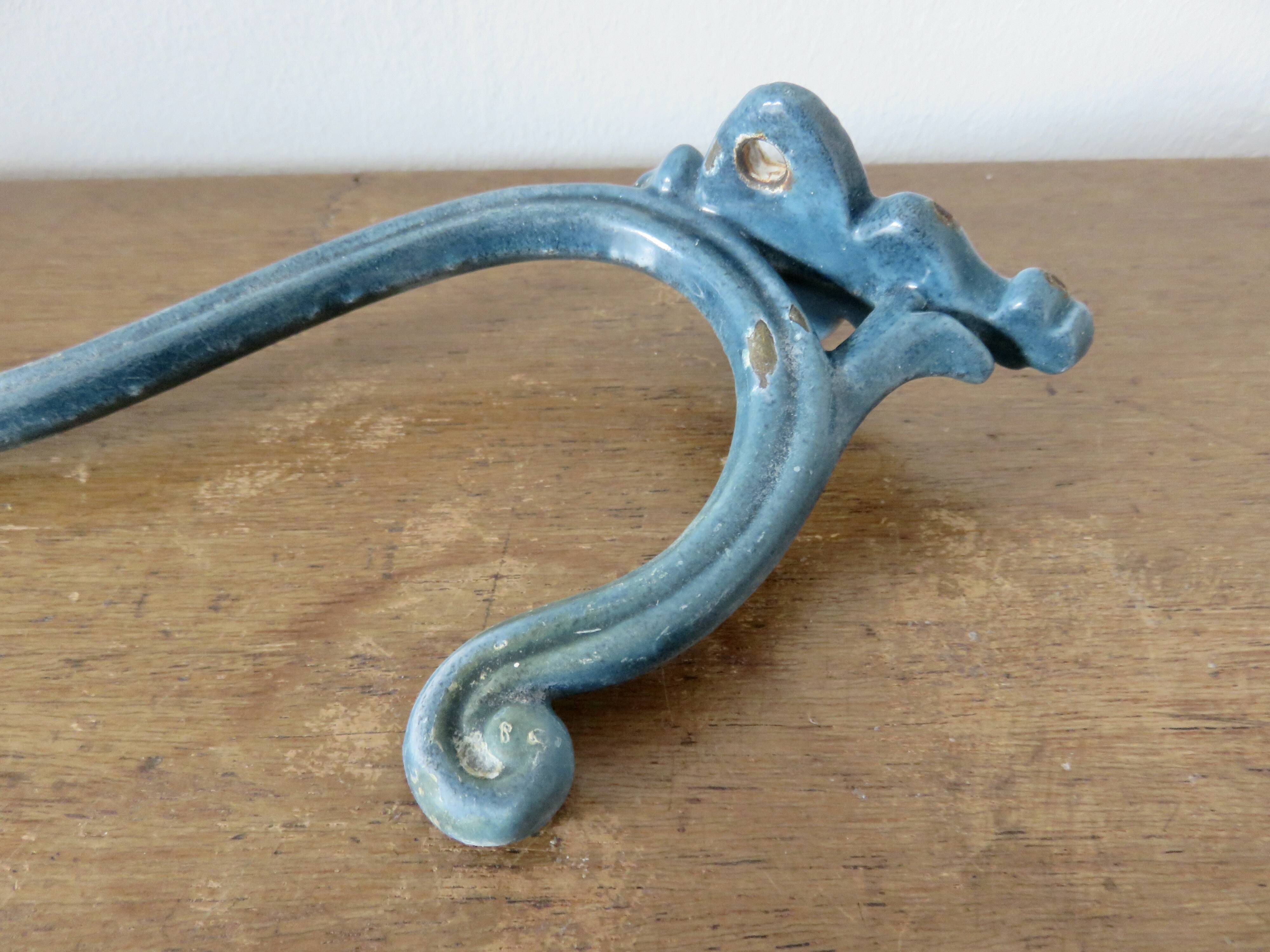 Old blue enamelled cast iron coat hook