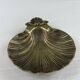Shell-shaped catch-all tray